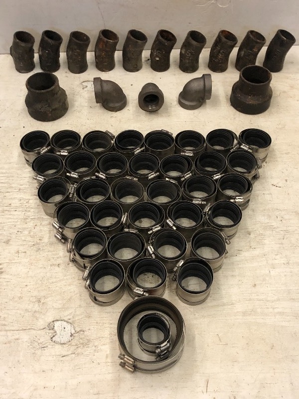 lot 45 image: Box Of Assorted Pipe Clamps