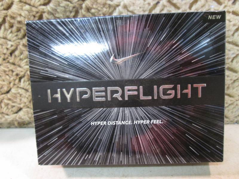 lot 30 image: Box of 12 Nike Hyper Flight Golf Ba...