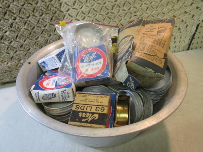 lot 36 image: Large Metal Bowl Full of Cannng Lid...