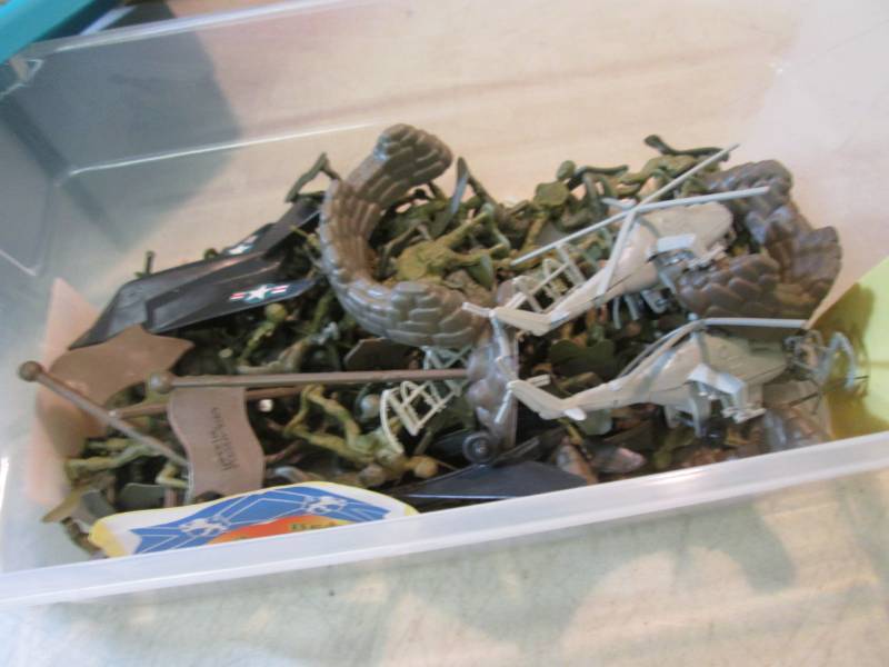 lot 48 image: Container with Lid Full of Green Ar...