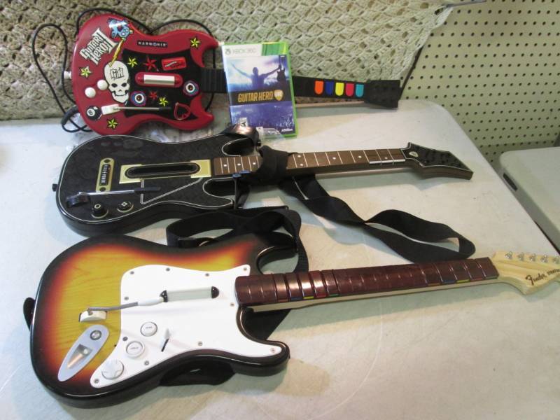 lot 66 image: X Box 360 Guitar Hero Live Game and...