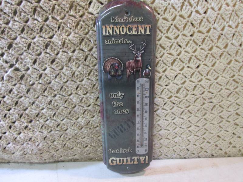 lot 74 image: Tin I Dont Shoot Innocent Animals....