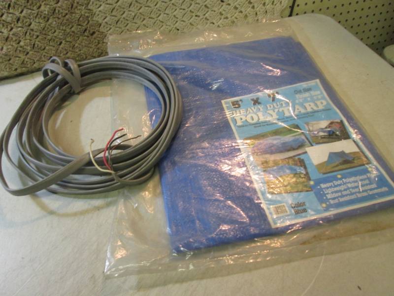 lot 110 image: 5 ft x 7 ft Heavy Duty Poly Tarp an...
