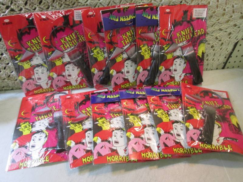 lot 191 image: Lot of 12 Knife Thru-Head Prank Pro...
