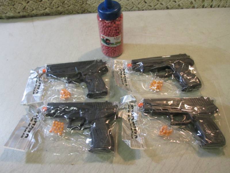 lot 195 image: Lot of 4 Airsoft Pistols and Bottle...