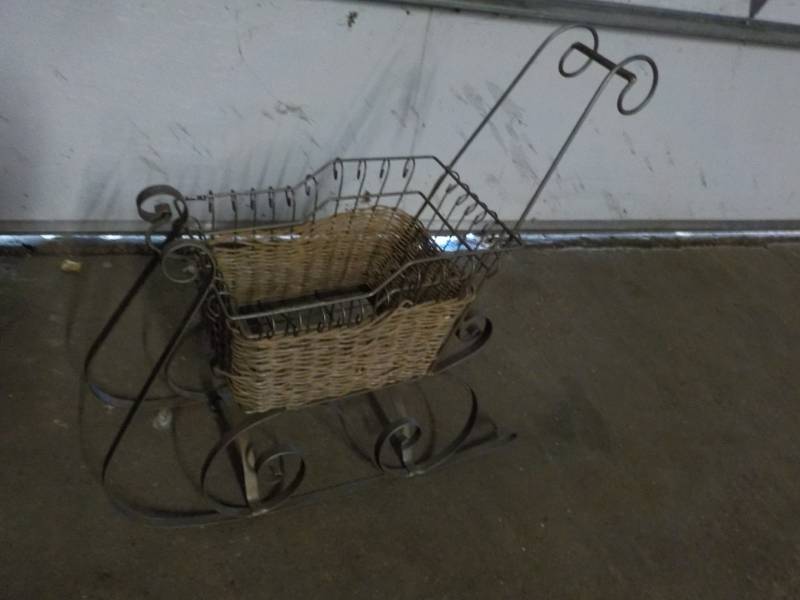 lot 162 image: Metal and Wicker Sled 28 x 25 tall...