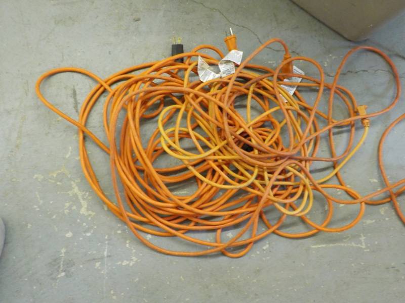 lot 192 image: Extension Cords and more in a tote...