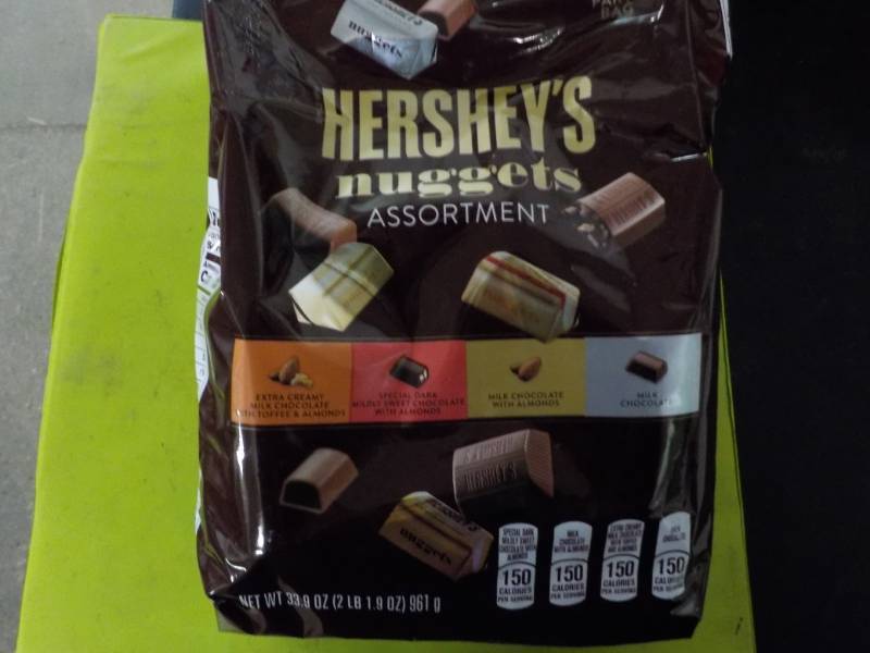 lot 303 image: 33.9 oz Bag Herseys Nuggets...