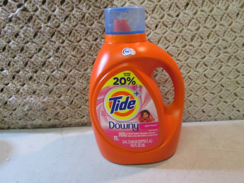 lot 8 image: Large Bottle of Tide Laundry Deterg...