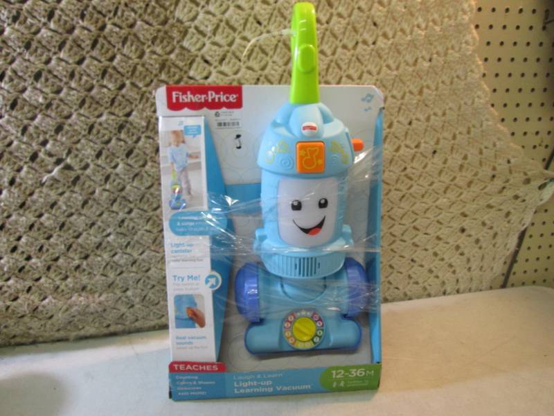 lot 26 image: Fisher Price Laugh & Learn Light-Up...