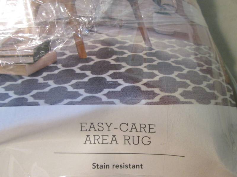 lot 28 image: 5 ft x 7 ft Easy-Care Area Rug  BS...