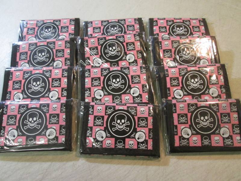 lot 111 image: Lot of 12 Pink Skull Tri-Fold Walle...