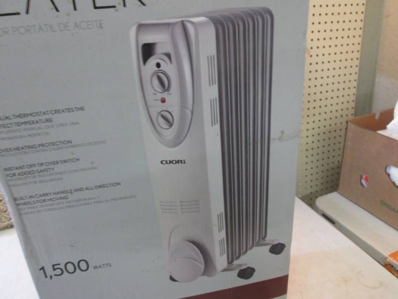 lot 138 image: Cuori Oil Filled Radiator Heater Op...