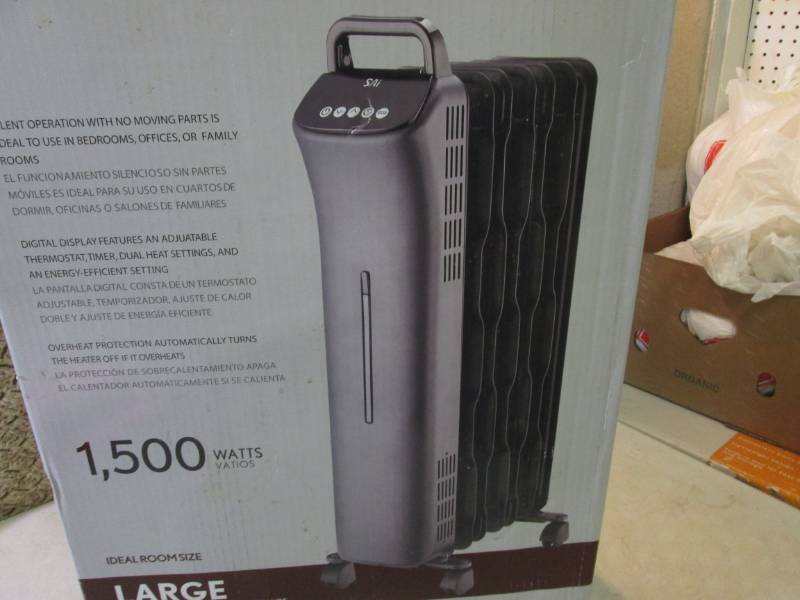 lot 140 image: SAI Oil Filled Radiator Heater Open...