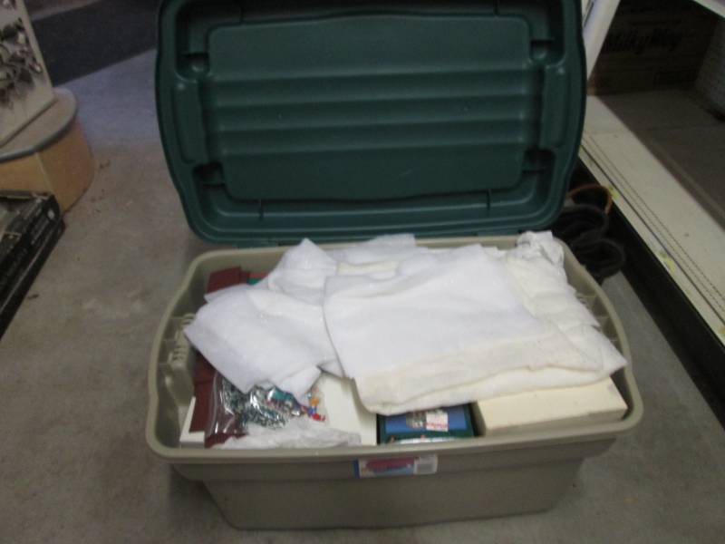 lot 216 image: 28 Gallon Tote with Hinged Lid Full...