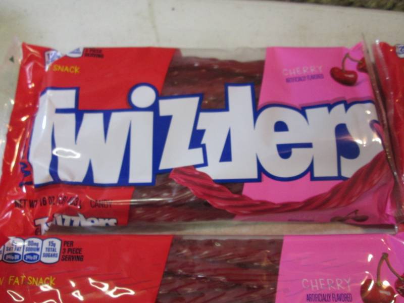 lot 243 image: 6 Packs of Cherry Twizzlers Best by...