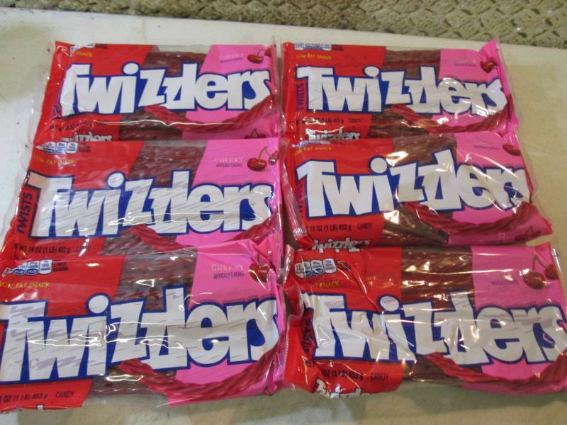 lot 244 image: 6 Packs of Cherry Twizzlers Best by...
