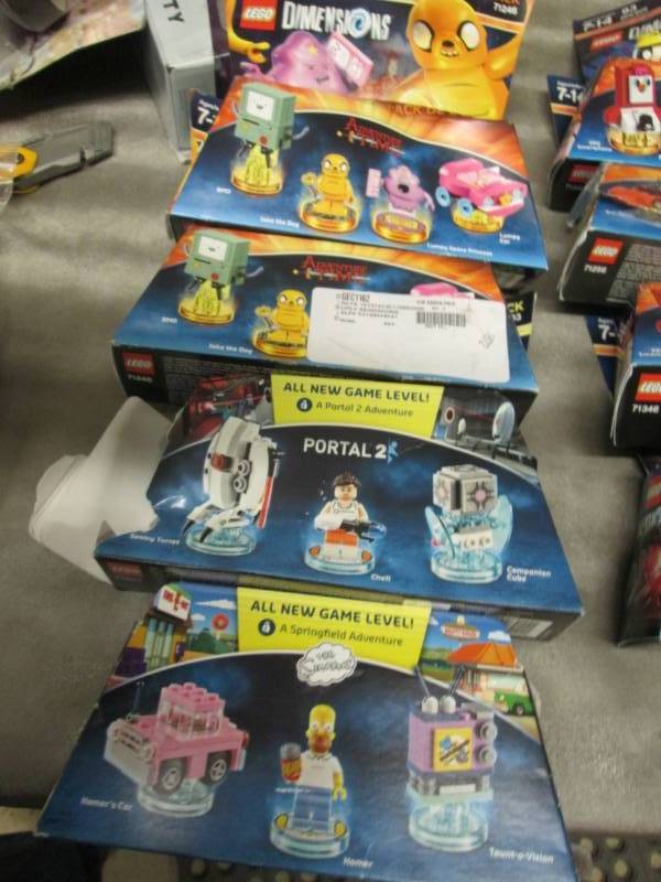4 Assorted Legos Dimensions Team Pa...