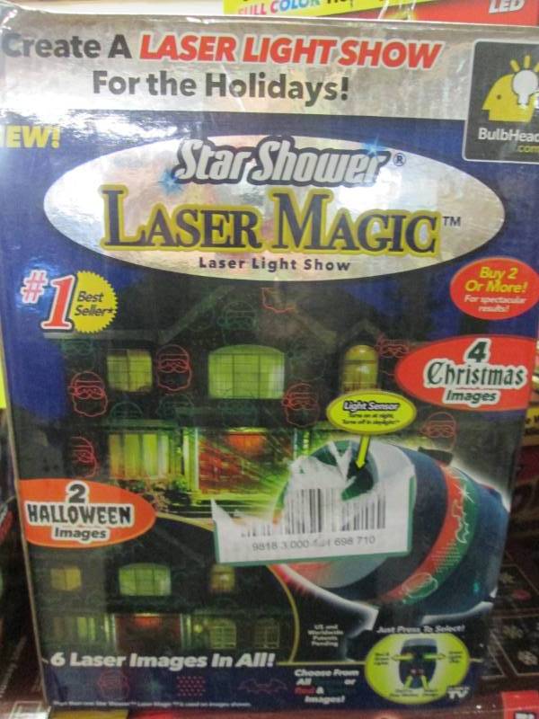 lot 56 image: Star Shower Laser Magic Open Box 9...