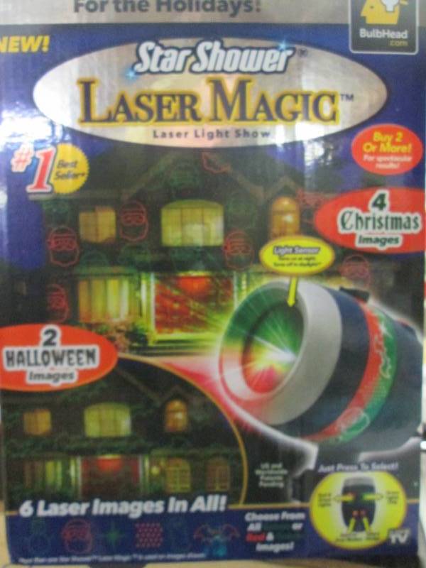 lot 57 image: Star Shower Laser Magic Open Box 9...