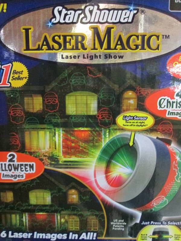 lot 59 image: Star Shower Laser Magic Open Box9C...