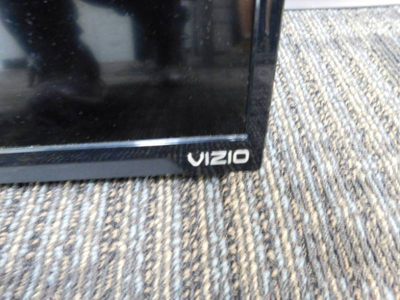 lot 39 image: 50 VIZIO Flat Screen TV w Mounting Brackets & Remote