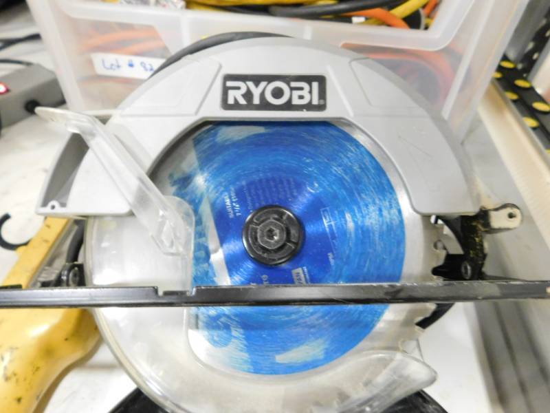 lot 84 image: Magnetic Ryobi 7 14 Curcular Saw & Portable Light
