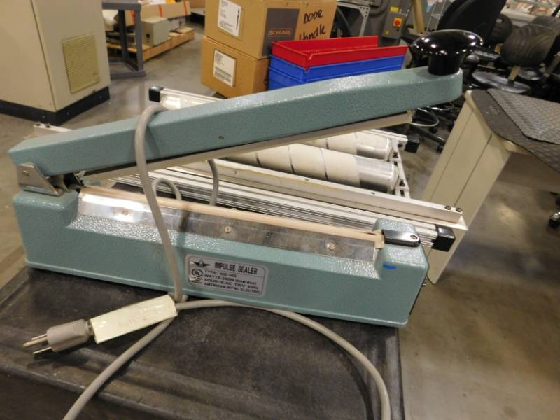 lot 132 image: Rubbermaid Cart, Heat Sealer, Door Handles, Splicing Table