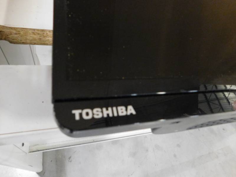 lot 203 image: 50 Toshiba Flat Screen TV with Mounting Bracket & Remote