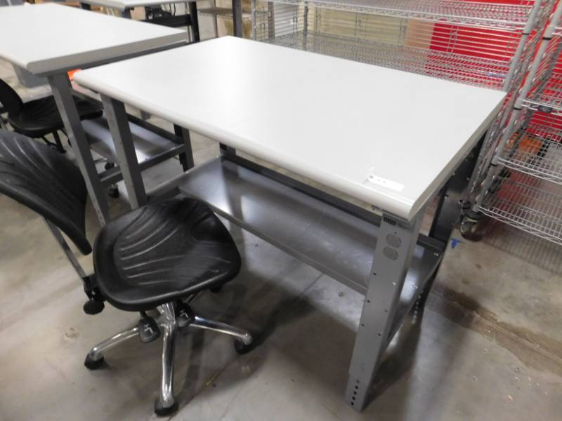 lot 208 image: Three Rolling Backless Chairs