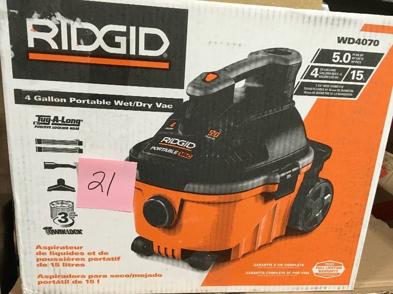 lot 21 image: RIDGID 4 Gal. 5.0-Peak HP Portable WetDry Vacuum  USED