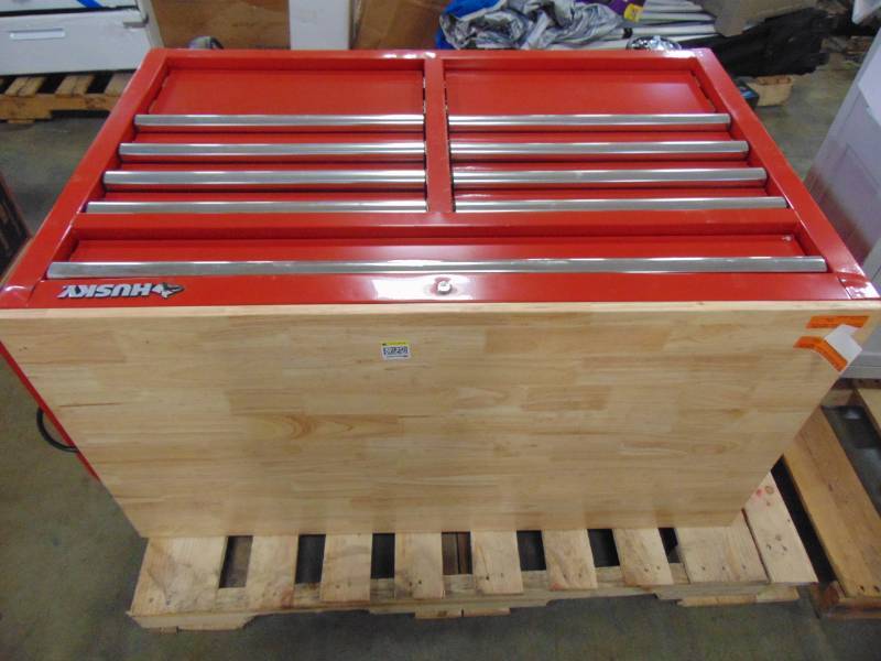 lot 29 image: Husky 46 in. W x 24.5 in. D 9-Drawer Mobile Workbench with Solid Wood Top in Red H46MWC9RXD