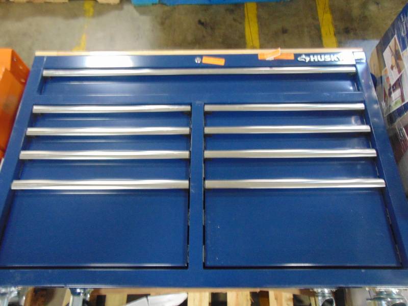 lot 31 image: Husky 46 in. W x 24.5 in. D 9-Drawer Tool Chest Mobile Workbench with Solid Wood Top in Gloss Blue H46MWC9GBXD