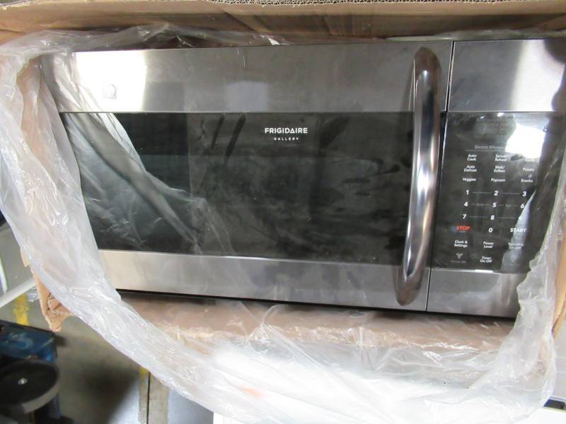 lot 2 image: Frigidaire Gallery 1.7-cu ft Over-the-Range Microwave with Sensor Cooking (Fingerprint-Resistant Black Stainless Steel) - Missing Plate