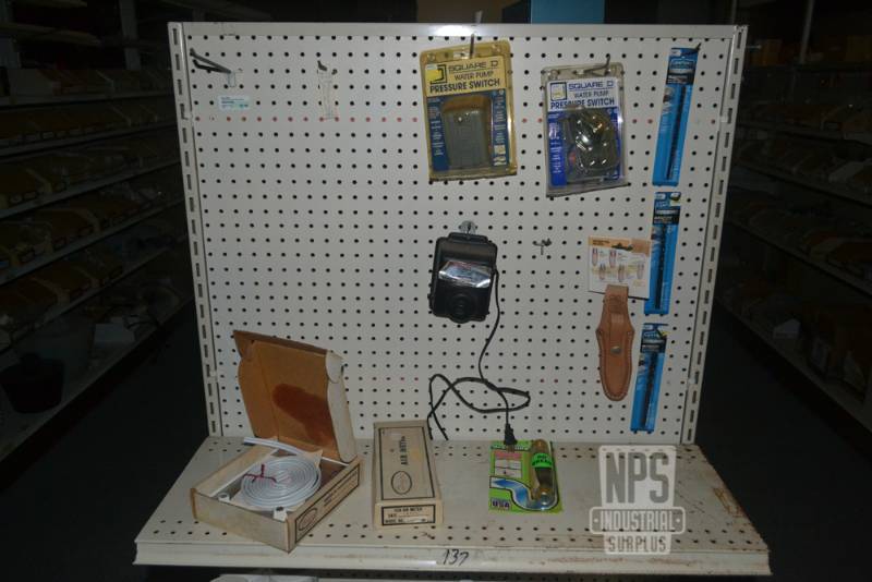 lot 68 image: Contents of Shelf 137 and Peg Board Contents above shelf 137  - Square D Pressure Switches, Drill Bits and More