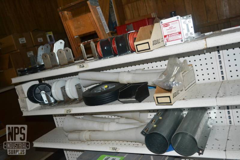 lot 95 image: Contents of Shelf 102,103,104  - NEW Caster Wheels, Pulleys and Hardware