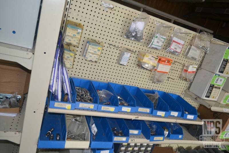 lot 116 image: Contents of Shelf 144,145 and Contents above Shelf 144 on Pegboard  - STINGY Piglet Waterer Inventory and Supplies