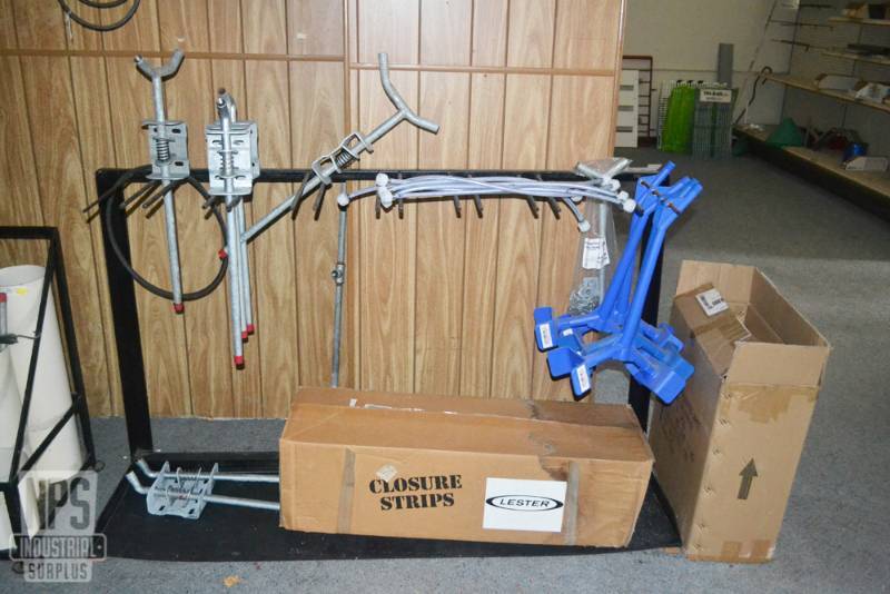 lot 123 image: 5 x 3 x 18 rack with Assorted Ag Supplies