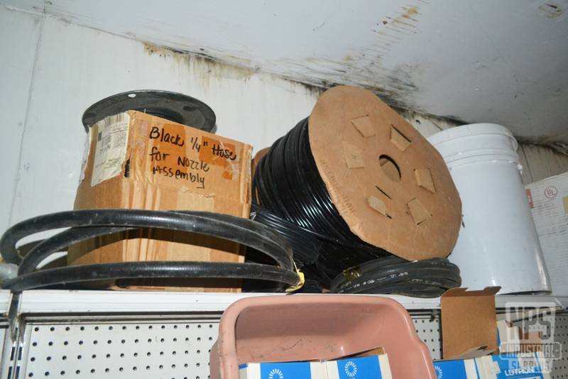 lot 144 image: Contents of Shelf 204  - Various Rolls of Black Tubing