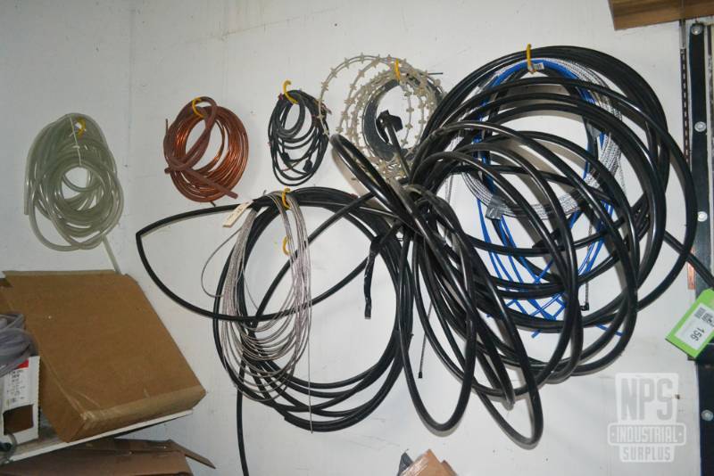 lot 156 image: Copper and Plastic Tubing Inventory on Wall and Shelf