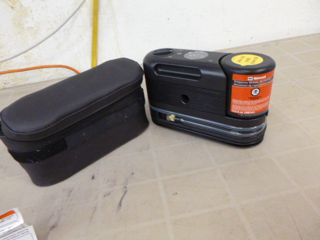 lot 30 image: Motorcraft Temporary Mobility Kit Canister