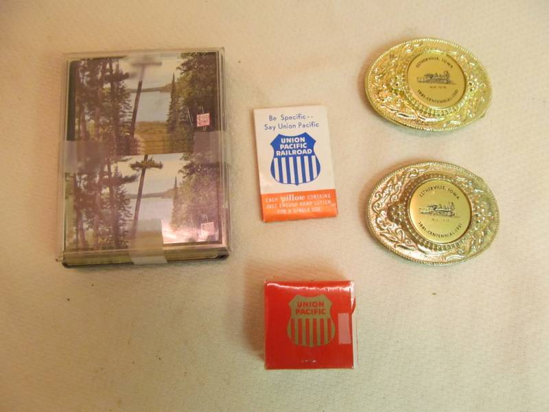 lot 36 image: 1981 centennial train belt buckles