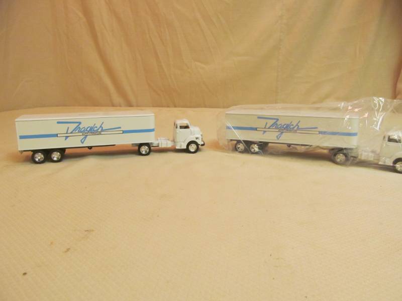 lot 70 image: Metal Semi coin banks