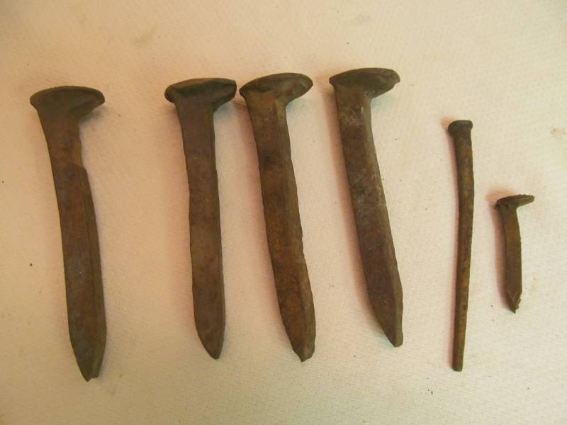 lot 102 image: Used railroad spikes
