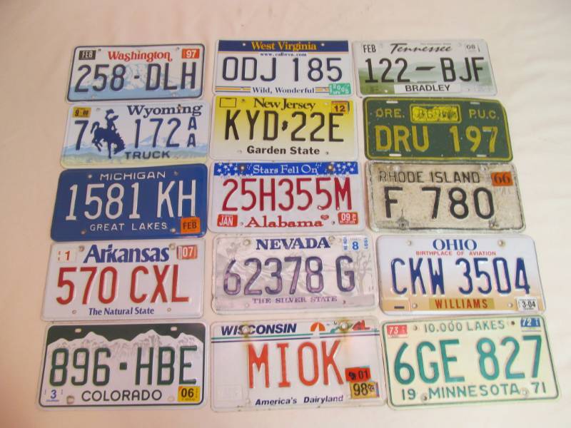 lot 142 image: vintage license plates