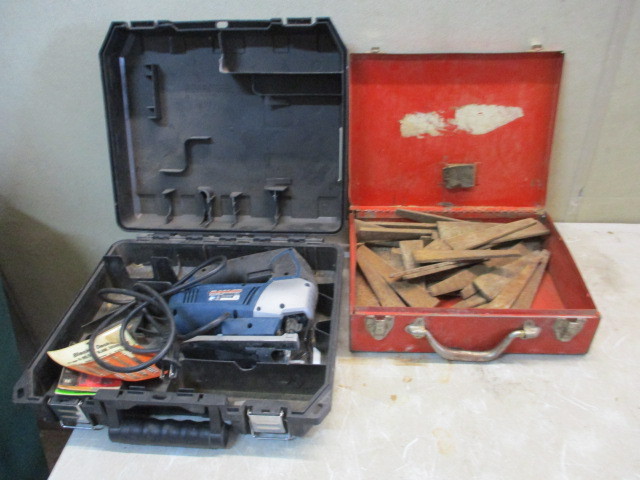 lot 47 image: Ryobi Jigsaw and box of wedges