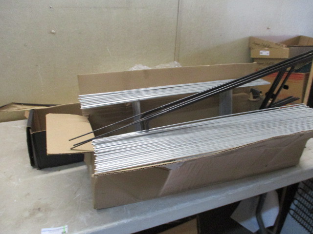 lot 64 image: Sign stakes and spring loaded sign frame kit