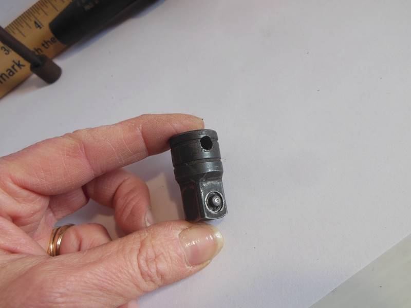 lot 220 image: Three Metal Pieces Snap-on Chuck, Possible Boring Item and Unknown German Made Finely Machined Two-Piece Item (not sure what it does, but its high quality)