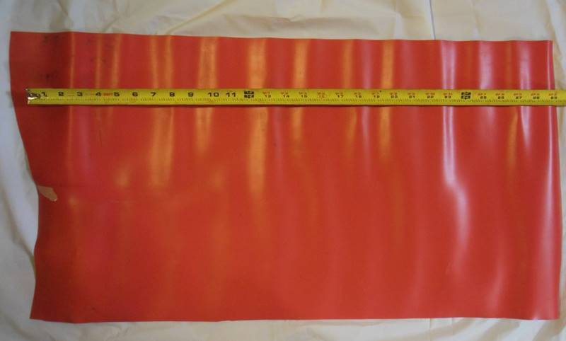 lot 252 image: Reddish Orange (Believed to be) Vinyl Fabric Piece - Possibly Seat Cover Material