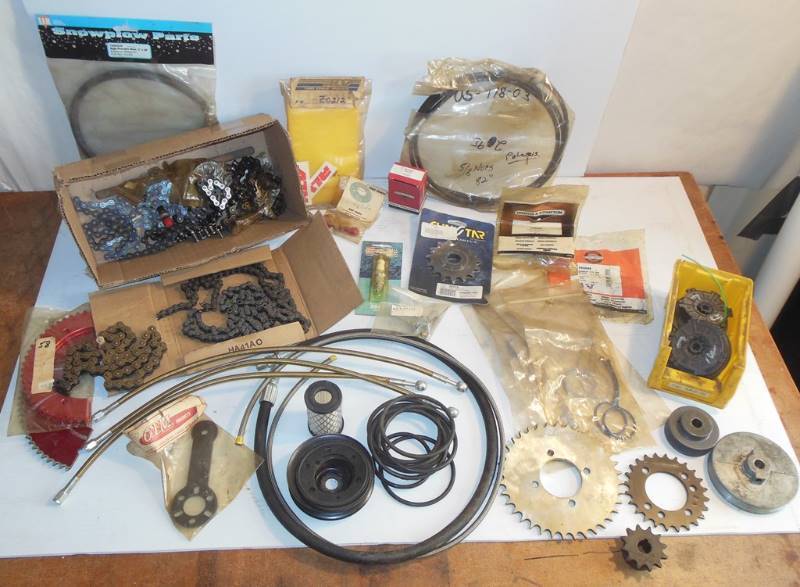 lot 84 image: New and Used Parts for Chain Saws, Weed Whips, Mowers, Snow Plows, Etc. Including Premier Motorsports 24 Tooth Sprocket, SWAT 36 Tooth Sprocket, Other Sprockets, Chains, Gates 4G2 Hydraulic Hose (see photos for more info) and Much more